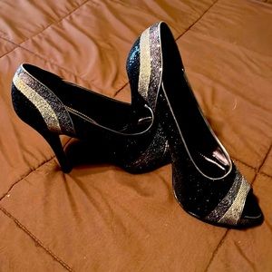 Rhinestone covered black and silver heels